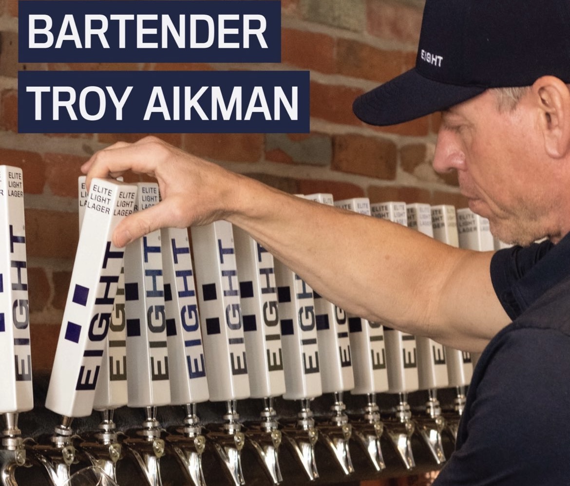 Troy Aikman serving