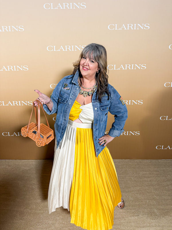 Dani Dudek of Spill the ATX attends the Clarins "A New Era" Celebration.